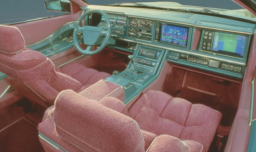 A nostalgic 1980s car interior with fabric seats, dashboard radio, analog clock, sunglasses, and night lights