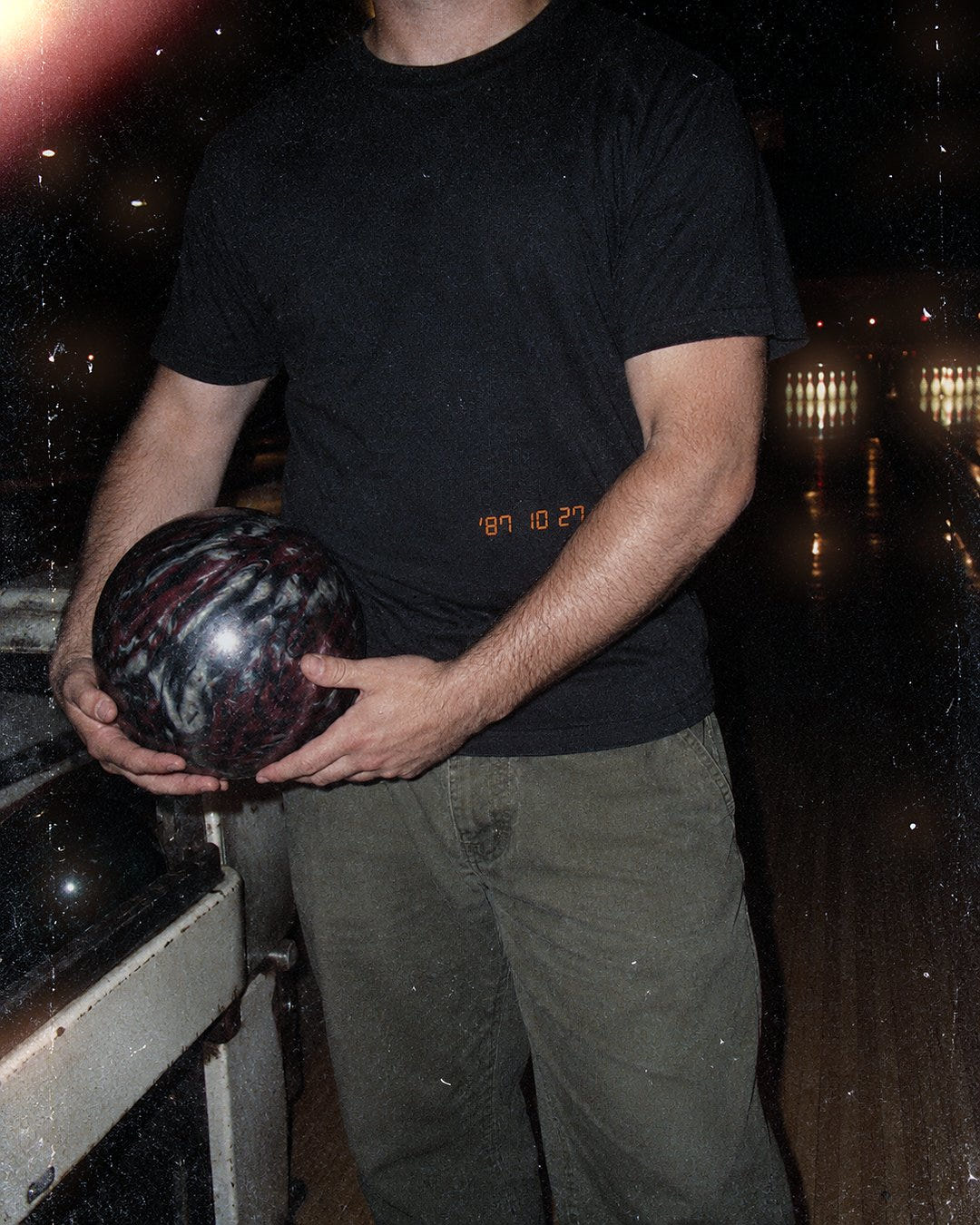 Date Stamp Tee 1987 at a bowling alley at night