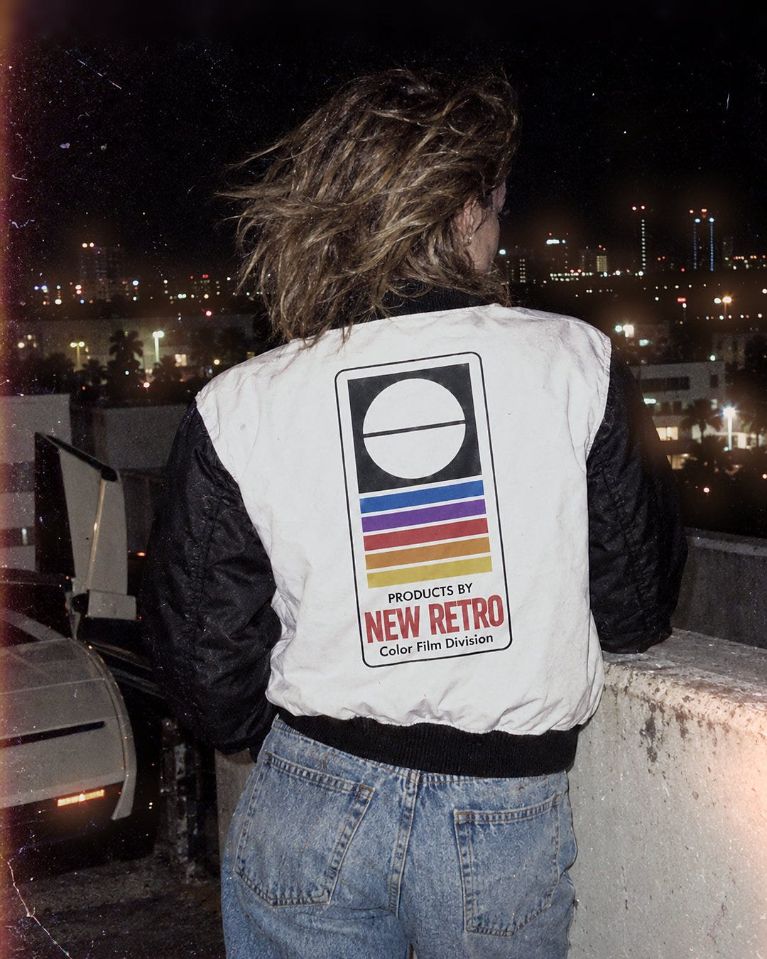 Color Film Bomber 1983 on a rooftop over the city lights